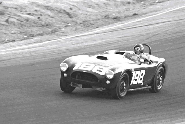 Dave MacDonald races the Carroll Shelby Cobra 260ci to its first ever win at Riverside International Raceway